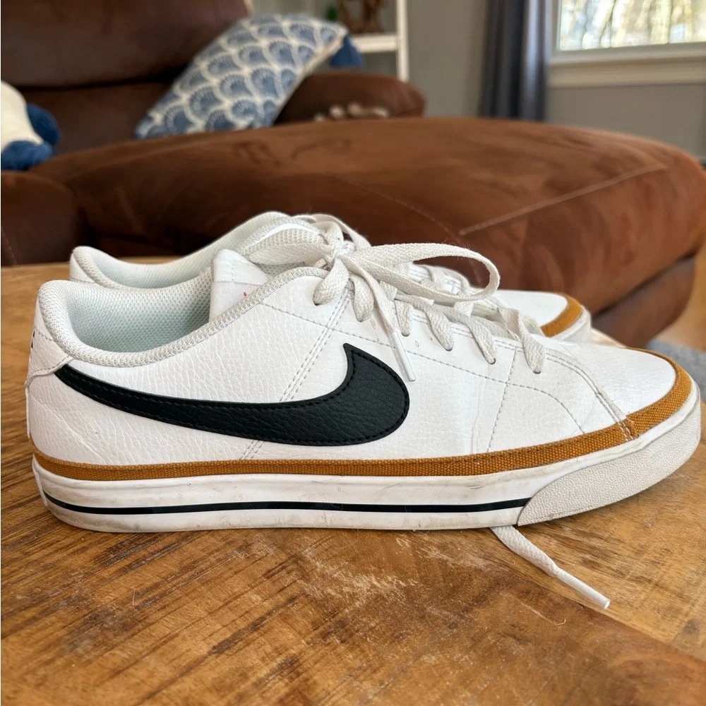 Nike White Low-Top Sneakers with Black Swoosh and Brown Accent - Picture 2 of 4